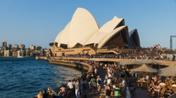 Visitors at the Circular Quay restaurants and boulevard in front of the Opera house during chinese new year celebrations in Sydney, Australia