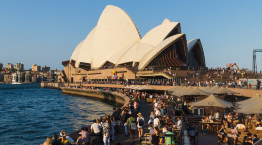 Visitors at the Circular Quay restaurants and boulevard in front of the Opera house during chinese new year celebrations in Sydney, Australia