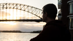 Man Looking at Sydney Harbour