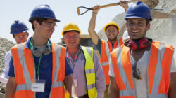Workers smiling together in quarry