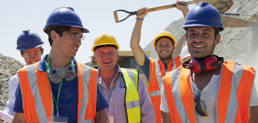 Workers smiling together in quarry