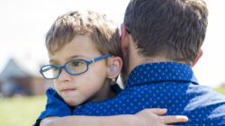 Father And Son Hugging On Outdoor summer