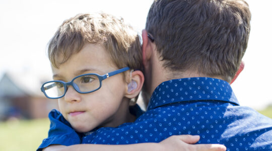 Father And Son Hugging On Outdoor summer