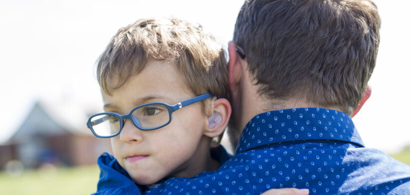 Father And Son Hugging On Outdoor summer