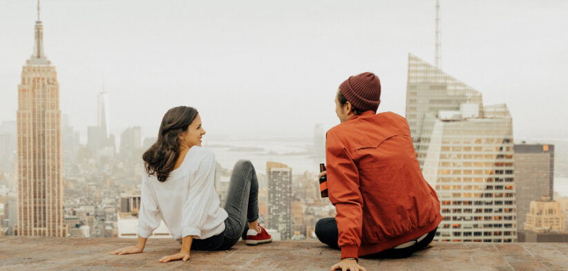 Rear view of couple embracing in New York
