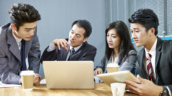team of asian business people meeting in office