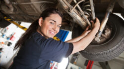 Portrait of smiling young female mechanic