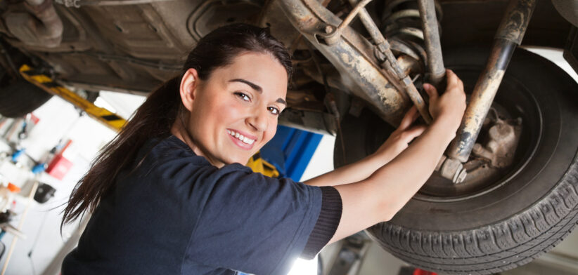 Portrait of smiling young female mechanic