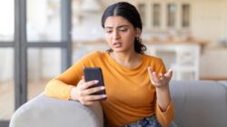 Woman looking at mobile phone