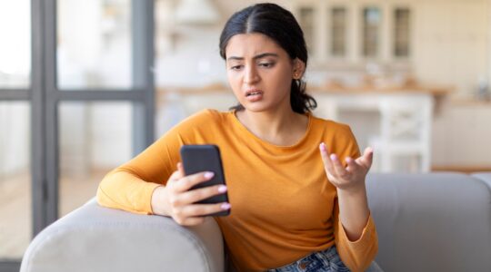 Woman looking at mobile phone