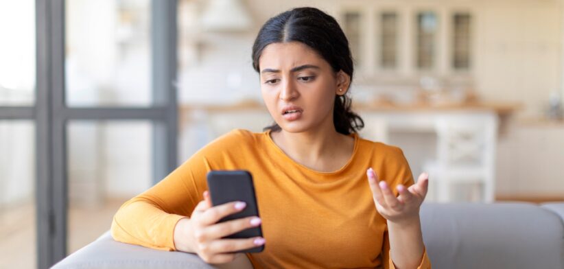 Woman looking at mobile phone