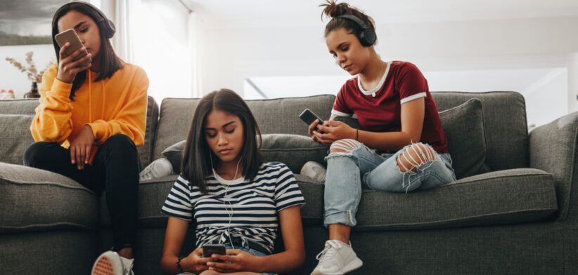 Teens on devices. Newsreel