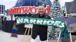 Dreamworld Chief Executive Greg Yong shows his backing for the Warriors