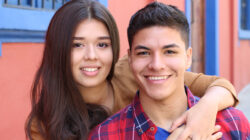 Young couple cuddling close up