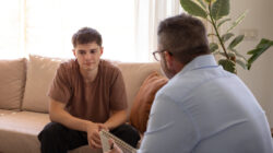 Young man in therapy with his psychologist