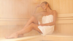 Pretty girl sitting in a sauna