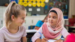 Muslim girl with her classmate