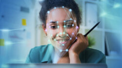 Woman with laptop, face recognition