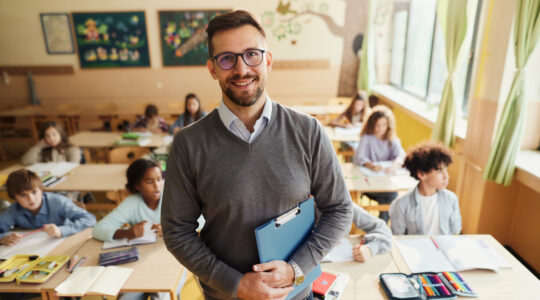 Happy elementary teacher