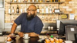 Maori Businessman Working in a New Zealand Bar or Cafe