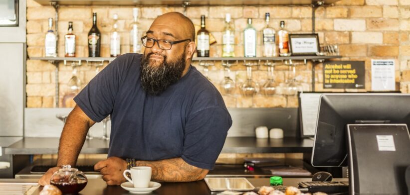 Maori Businessman Working in a New Zealand Bar or Cafe