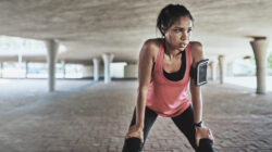 Woman stopping to catch her breath while exercising
