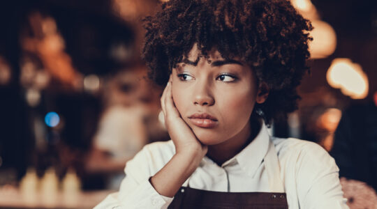 Tired young lady looking aside