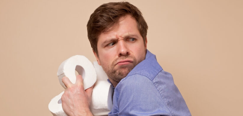 Man with toilet paper