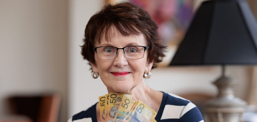 Happy woman with money