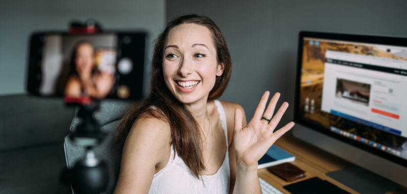 Woman vlogging at home