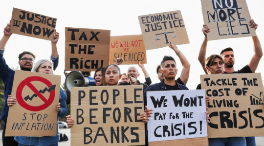 Crowd of people protest against inflation
