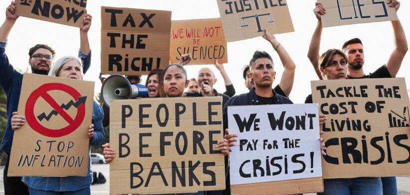 Crowd of people protest against inflation