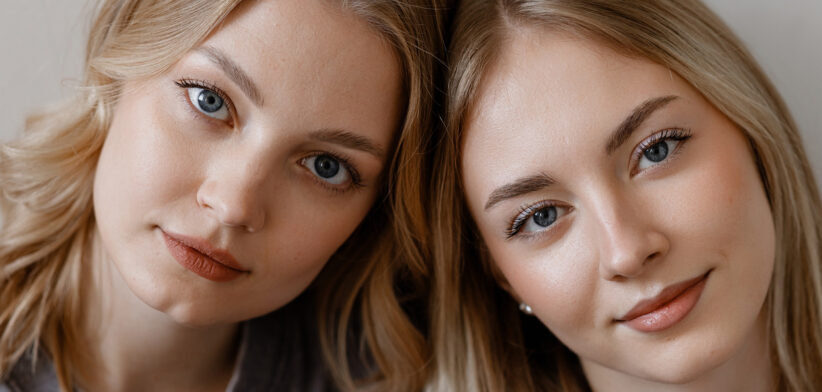 Close portrait of two blonde women