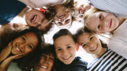 laughing group of kids in circle